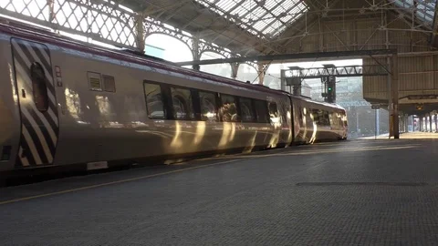 Silver train departing Vídeos de archivo 72995340