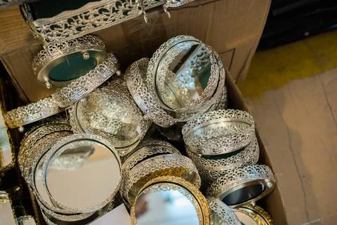 Silver treasure lined up on each other in the box 스톡 사진