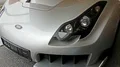 Silver TVR Sagaris exhibition automobile front view in showroom 4k 4k or 4k+ Resolution