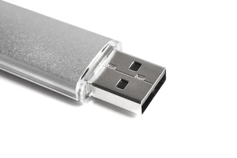 Silver USB Flash Drive closeup on white background. Detail Stock Photos
