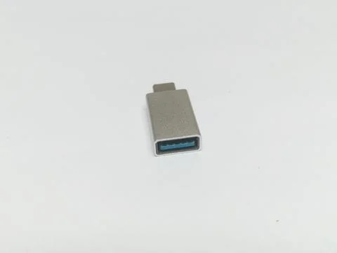 Silver USB Type C adapter showing blue USB 3.0 port 스톡 사진