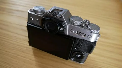 Silver vintage camera with modern features Stock Illustration