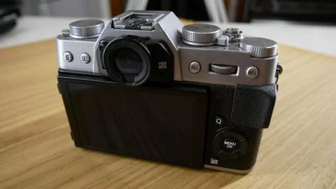 Silver vintage camera with modern features Stock Illustration