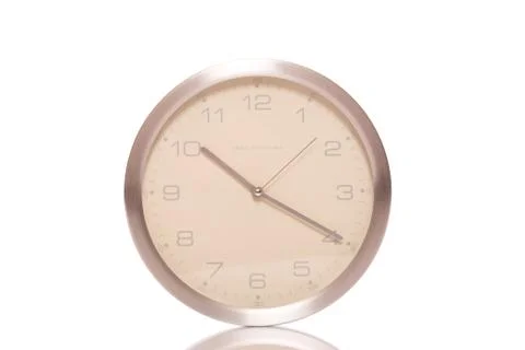 Silver wall clock Stock Photos