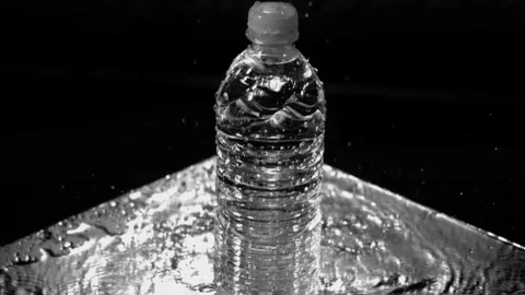 Silver Water Bottle Splash Slow Motion 03 Stock Footage 71435477