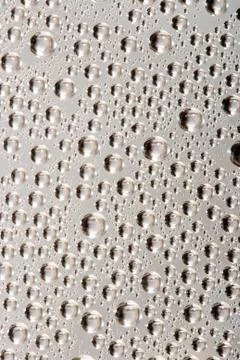 Silver water drops Stock Photos