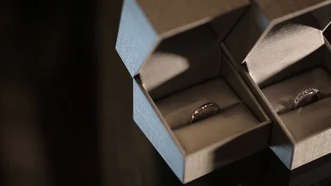 Silver Wedding Rings in the white box macro closeup shoot diamon Jewellery Stock-Footage 93720381