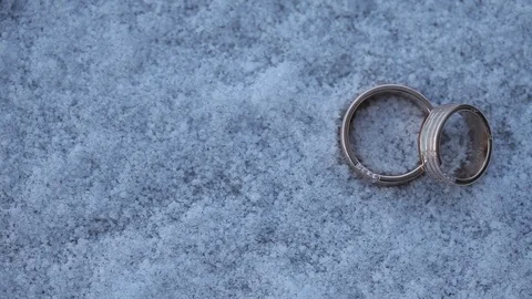 Silver Wedding on the SnowRings macro closeup shoot diamon Jewellery Stock-Footage 93714353