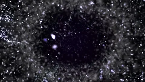 Silver White Glitter Dust Particles Floating Through Dark Space with Sparkling Stock Footage 336746886