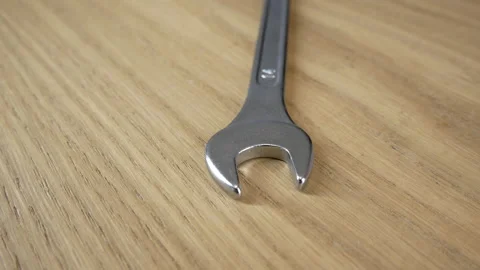 Silver wrench on the table 스톡 동영상 130243003