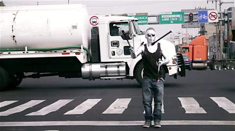 Silverman Juggling Fire on the Street Stock Footage 63085237