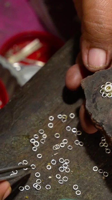 Silversmith Assembling Silver Jewelry, Vertical Stock Footage 320090888