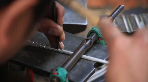 Silversmith working with silver craft in Lijiang old town Stock Footage 51419618