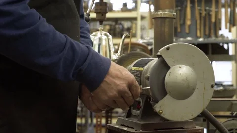 Silversmith working on silverware Stock-Footage 83399707