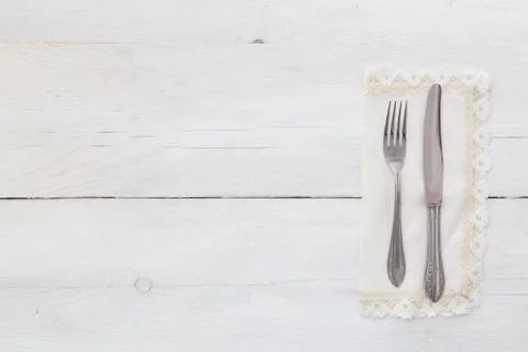 Silverware on a light wood Stock Photos