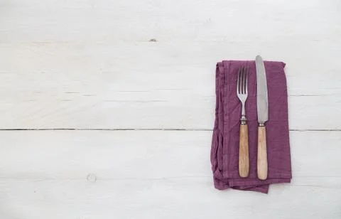 Silverware on a light wood Stock Photos