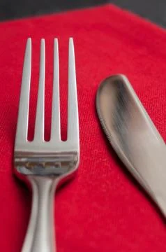 Silverware  on red napkin Stock Photos