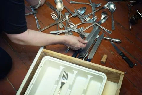 Silverware spread out on floor Fotos Stock