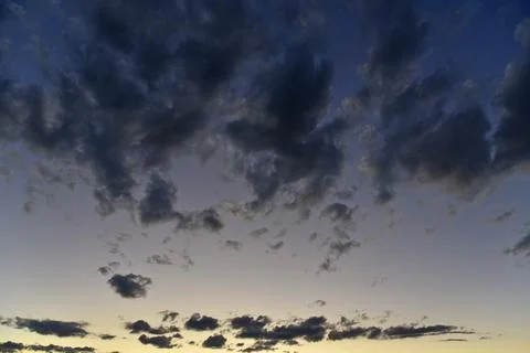 Silvery clouds in the blue sky in the evening. Beautiful blue clouds on a sum Foto stock