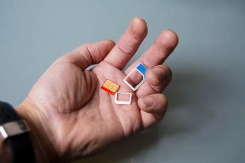 SIM cards In Hand 写真素材