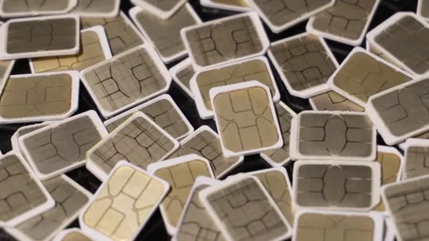 SIM cards rotating Stock Footage 254989241