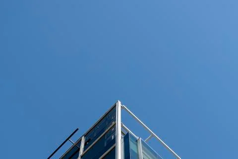 Simetrical shot of a building architecture on a blue sky Stock Photos