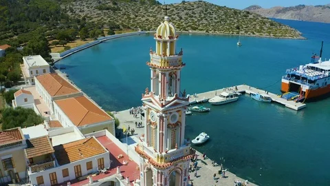 Simi, Greece - September 22, 2019 : Aerial view frome drone Panormitis monastery Stock Footage 118874196