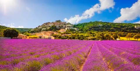 Simiane la Rotonde village and lavender panorama. Provence, France Stock Photos