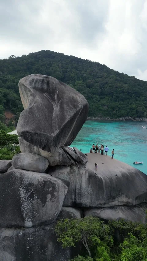 SIMILAN ISLANDS THAILAND 8 MAY 2026 Aerial View of Sail Rock in Bay Stock Footage 341008334