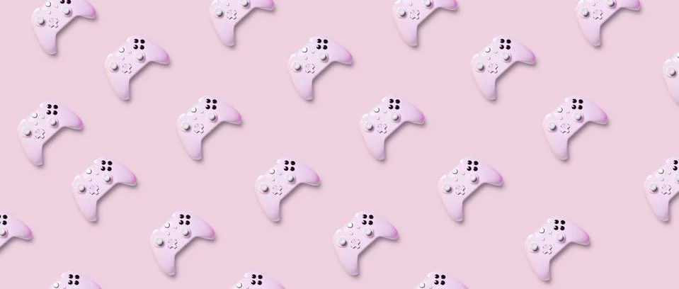 Simless pattern from white joyisticks on pink background. Stock Photos