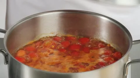 Simmering tomato soup Stock Footage 24667073