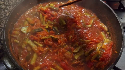 Simmering Vegetable Stew in a Cooking Pot on Stove Stock Footage 274438445
