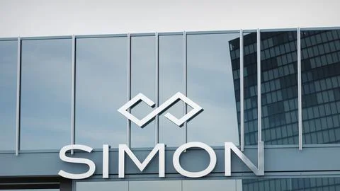 Simon Property Group Stock data presented on the logo of the office facade Stock Photos