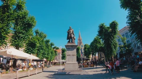 The Simon Stevin Square or Simon Stevinplein during busy sunny day, Church of Ou Stock Footage 95684142