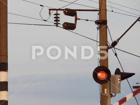 Simophor with the barrier at the crossing lights up red Stock Photos