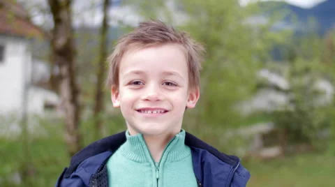 Simpathic kid smiling in camera.mov Stock Footage 49763224