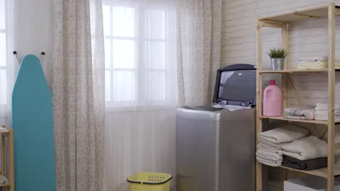 Simple and clean home laundry room Stock Footage 136745054