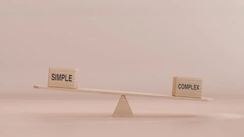 SIMPLE AND COMPLEX BALANCING ON SEESAW Stock Footage 294675319