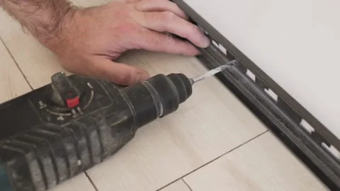 A simple and effective way to install a plinth at home with your own hands 動画素材 147172653