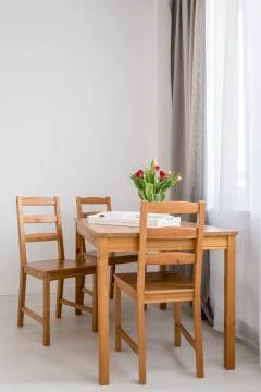 Simple and functional dining room idea 库存照片