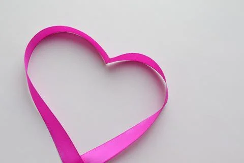 Simple background with a ribbon heart Stock Photos