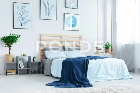 Simple bedroom with double bed Stock Photos
