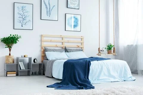 Simple bedroom with double bed Stock Photos