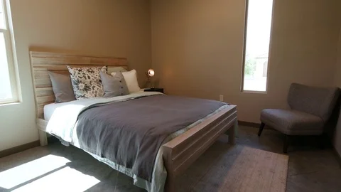 Simple Bedroom Lower Move from Ceiling Fan Stock Footage 77168309