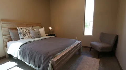 Simple Bedroom Rising Move to Ceiling Fan Stock Footage 77168127