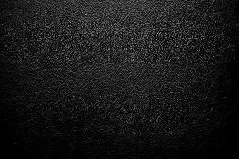 Simple black Background,Leather Texture with gradient light used as luxury Stock Photos