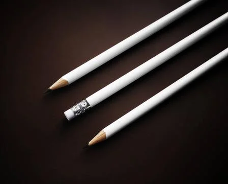 Simple blank pencils Photo of three simple blank pencils on dark backgroun... Stock Photos