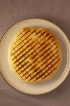 Simple breakfast presentation. Artful display of toasted bread on plate Stock Photos