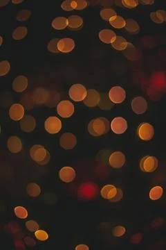 Simple Christmas background pattern vertical picture golden dark lights from  Stock Photos
