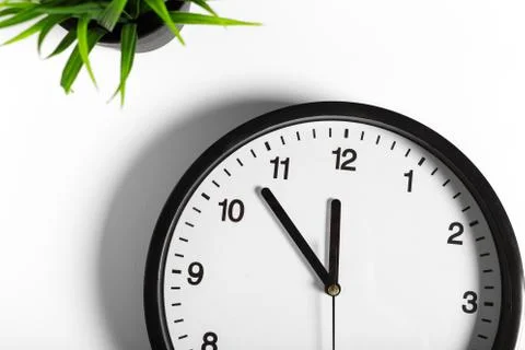 Simple classic black and white round wall clock Stock Photos